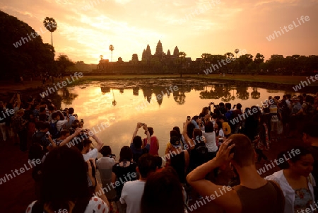 Tourists at the Angkor Wat in the Temple City of Angkor near the City of Siem Riep in the west of Cambodia.