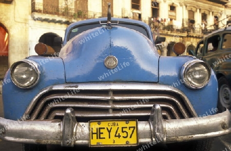 old cars in the old townl of the city of Havana on Cuba in the caribbean sea.