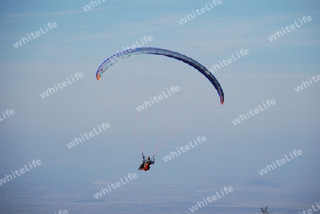 Man with a hang glider