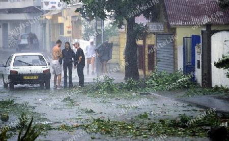  a tropical storm in the town of  St Gilles les Bains  on the Island of La Reunion in the Indian Ocean in Africa.