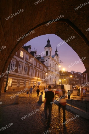 The old Citywall und Barbakane in the old Town in the City of Warsaw in Poland.