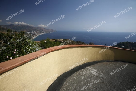 the coast of the old Town of  Taormina in Sicily in south Italy in Europe.