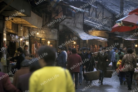 people on the Market streets of Chongqing in the province of Sichuan in china in east asia. 