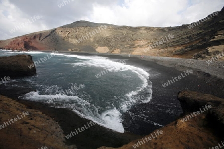 the Landscape of El Golfo on the Island of Lanzarote on the Canary Islands of Spain in the Atlantic Ocean. on the Island of Lanzarote on the Canary Islands of Spain in the Atlantic Ocean.
