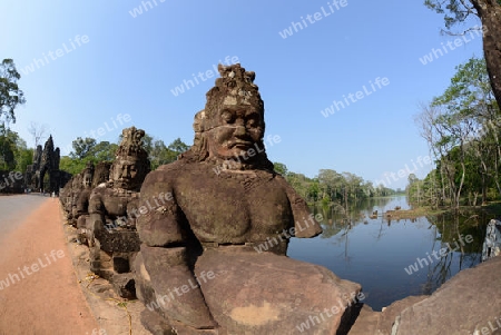 The Bridge at the Angkor Tom Gate in the Temple City of Angkor near the City of Siem Riep in the west of Cambodia.