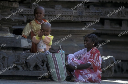 a family at the Temple of the Village of Hampi in the province of Karnataka in India.