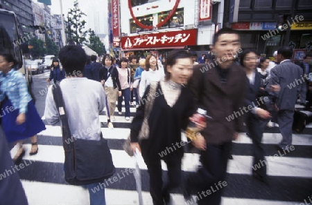 on the streets in the City centre of Tokyo in Japan in Asia,



