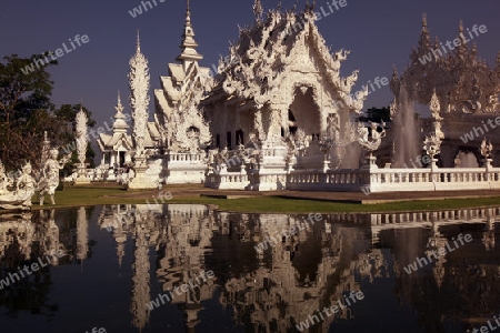 Der Tempel Wat Rong Khun 12 Km suedlich von Chiang Rai in der Provinz chiang Rai im Norden von Thailand in Suedostasien.