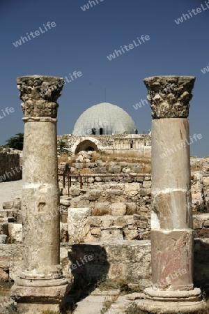 The Ruins of the citadel Jabel al Qalah in the City Amman in Jordan in the middle east.