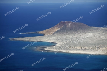 The  Isla Graciosa from the Mirador del Rio viewpoint on the Island of Lanzarote on the Canary Islands of Spain in the Atlantic Ocean. on the Island of Lanzarote on the Canary Islands of Spain in the Atlantic Ocean.
