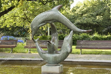 brunnen mit drei delphine