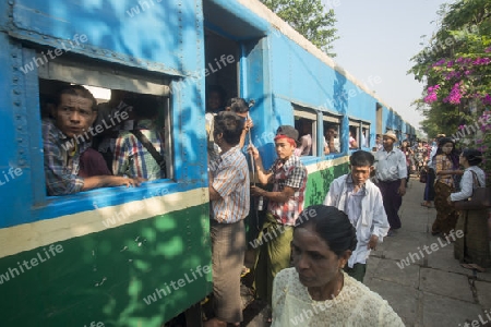 a train of the Yangon circle train in a trainstation near the City of Yangon in Myanmar in Southeastasia.