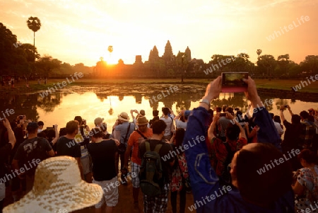 Tourists at the Angkor Wat in the Temple City of Angkor near the City of Siem Riep in the west of Cambodia.