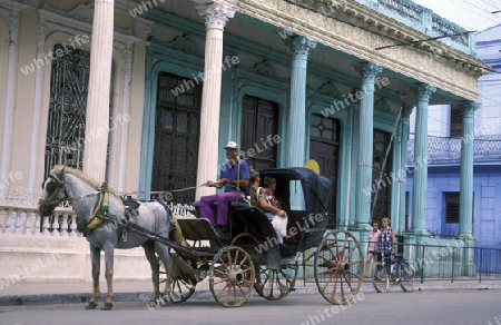 a horse cart Taxi transport in the old town of cardenas in the provine of Matanzas on Cuba in the caribbean sea.