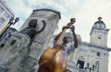 a Salsa Music Band on the Parce Cespedes in the city of Santiago de Cuba on Cuba in the caribbean sea.