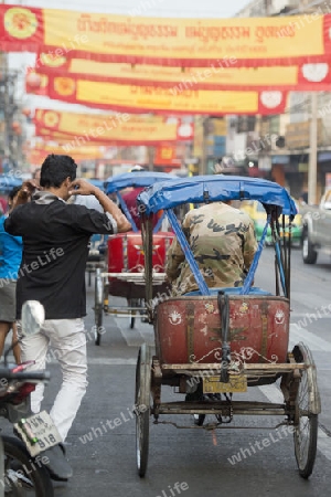 Bicycle Ricksha Taxis at the morning Market in Nothaburi in the north of city of Bangkok in Thailand in Southeastasia.