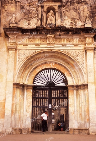 the old ruin of a church in the old town in the city of Antigua in Guatemala in central America.   