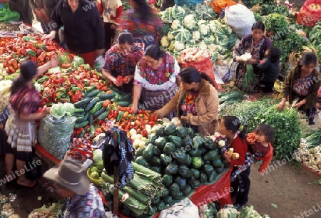 people in traditional clotes at the Market in the Village of  Chichi or Chichicastenango in Guatemala in central America.   