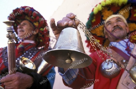 Traditional water seller at the Djemma del Fna Square in the old town of Marrakesh in Morocco in North Africa.
