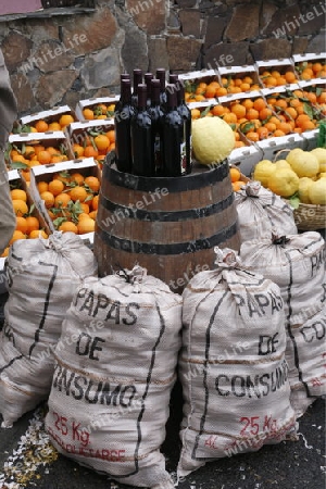 Potato and Wine at a Market in the  mountain Village of  Tejeda in the centre of the Canary Island of Spain in the Atlantic ocean.