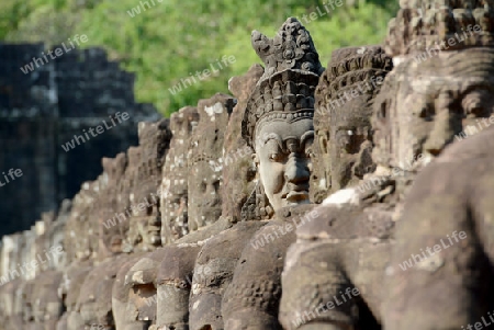 The Angkor Tom Gate in the Temple City of Angkor near the City of Siem Riep in the west of Cambodia.