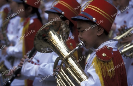 a child music Band in the city of wushan on the yangzee river near the three gorges valley up of the three gorges dam project in the province of hubei in china.