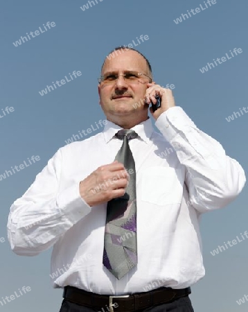 businessman talking with modern cellphone 