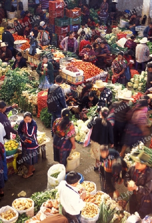 people in traditional clotes at the Market in the Village of  Chichi or Chichicastenango in Guatemala in central America.   