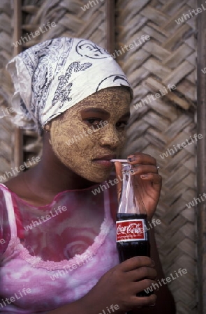 a women in the city of Moutsamudu on the Island of Anjouan on the Comoros Ilands in the Indian Ocean in Africa.   