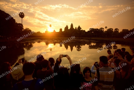 Tourists at the Angkor Wat in the Temple City of Angkor near the City of Siem Riep in the west of Cambodia.