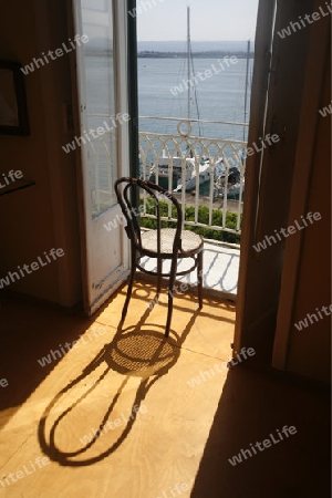 a Balcony an the seaside in the old Town of Siracusa in Sicily in south Italy in Europe.