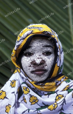 a women in the city of Moutsamudu on the Island of Anjouan on the Comoros Ilands in the Indian Ocean in Africa.   