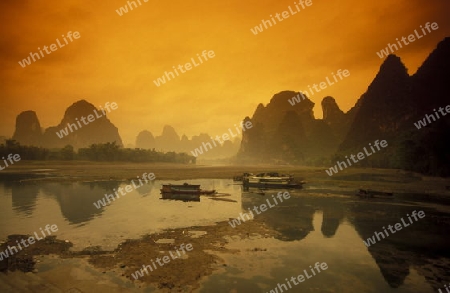 the landscape at the Li River near Yangshou near the city of  Guilin in the Province of Guangxi in china in east asia. 