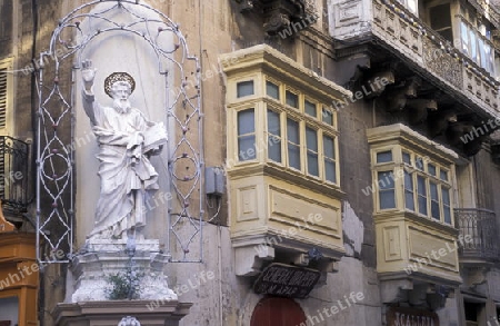 The traditional Balconys on the Houses in the Old Town of the city of Valletta on the Island of Malta in the Mediterranean Sea in Europe.
