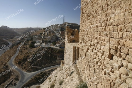 The Karak Castle in the Village of Karak in Jordan in the middle east.
