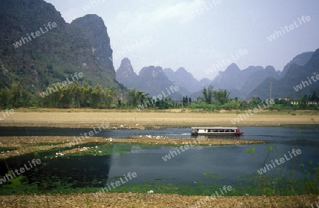 the landscape at the Li River near Yangshou near the city of  Guilin in the Province of Guangxi in china in east asia. 