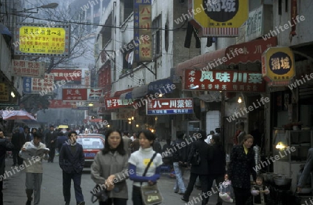 people on the Market streets of Chongqing in the province of Sichuan in china in east asia. 