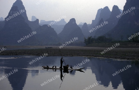 the landscape at the Li River near Yangshou near the city of  Guilin in the Province of Guangxi in china in east asia. 