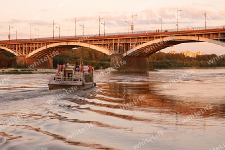 A Bridge and the Wistla River in the City of Warsaw in Poland, East Europe.