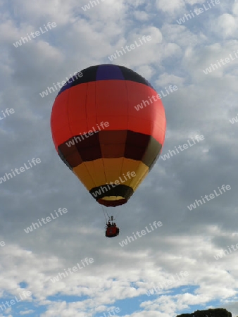 Balloon and storm clouds