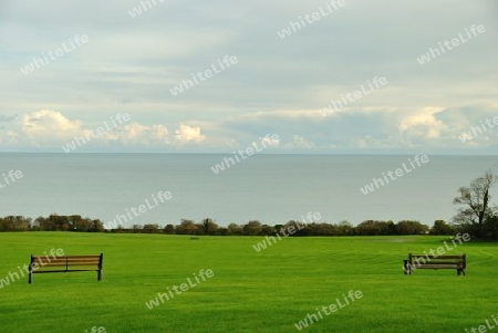 Two parkbenches in the nature