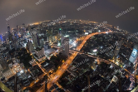 The Skyline view from the Sky Bar at the Riverside Aerea in the city of Bangkok in Thailand in Southeastasia.