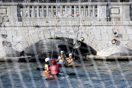 a Water Kanu Ball Game in the Harbour in the old town of Siracusa in Sicily in south Italy in Europe.