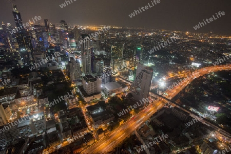 The Skyline view from the Sky Bar at the Riverside Aerea in the city of Bangkok in Thailand in Southeastasia.