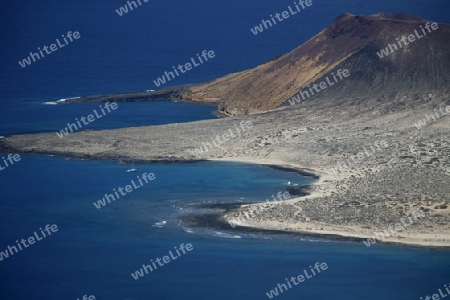 The  Isla Graciosa from the Mirador del Rio viewpoint on the Island of Lanzarote on the Canary Islands of Spain in the Atlantic Ocean. on the Island of Lanzarote on the Canary Islands of Spain in the Atlantic Ocean.
