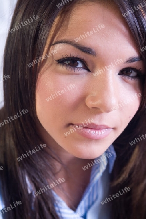 Beautiful young woman face close up