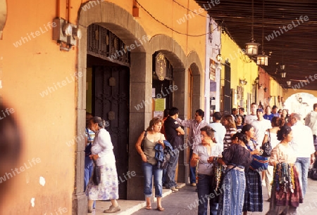 people in the old town in the city of Antigua in Guatemala in central America.   