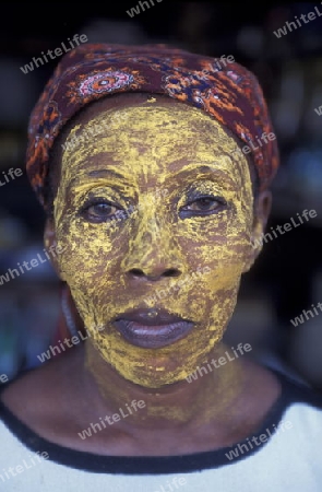 a women in the city of Moutsamudu on the Island of Anjouan on the Comoros Ilands in the Indian Ocean in Africa.   