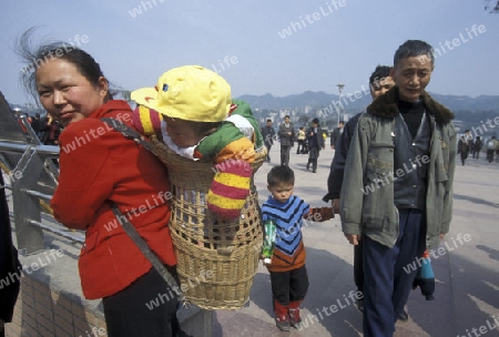 a chinese Family with childern in the city of Chongqing in the province of Sichuan in china in east asia. 