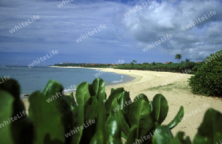 Ein Strand in Nusa Dua im Sueden der Insel Bali in Indonesien in Suedostasien.